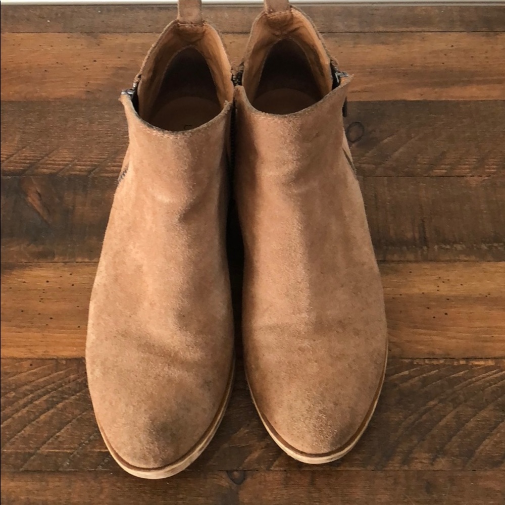 Brown suede ankle booties.